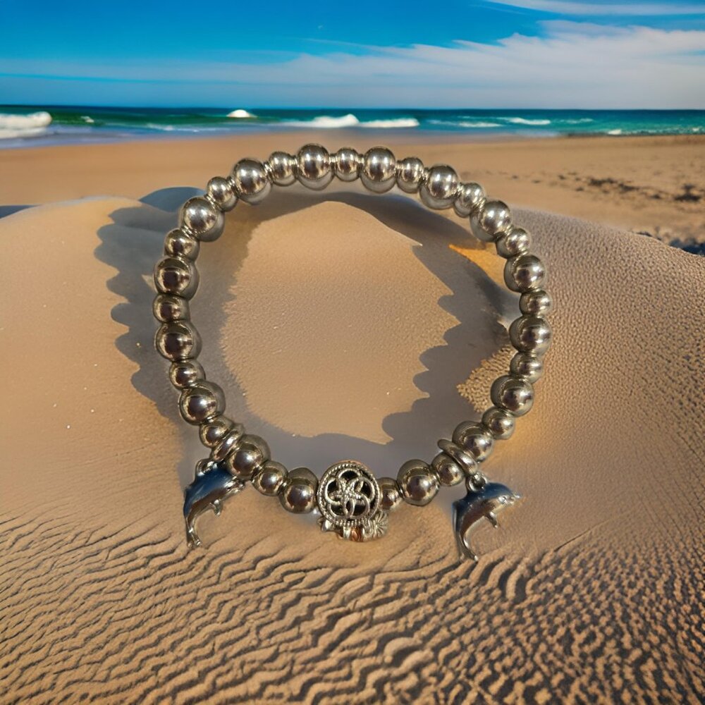 Dolphins /Dreamcatcher charm Bracelet on Hematite 7 in.